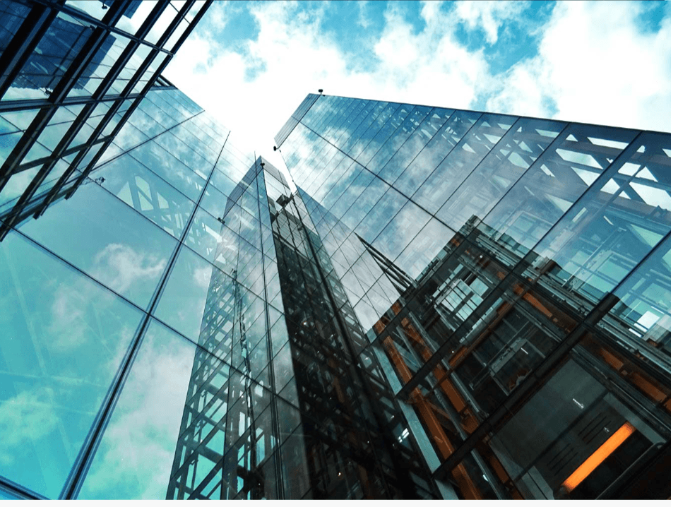 Modern glass office buildings seen from below